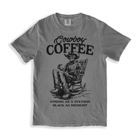 Flat lay of grey Cowboy Coffee graphic tee — country style shirt for caffeine lovers