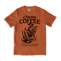 Flat lay of Cowboy Coffee shirt in yam — rustic country tee with black coffee print