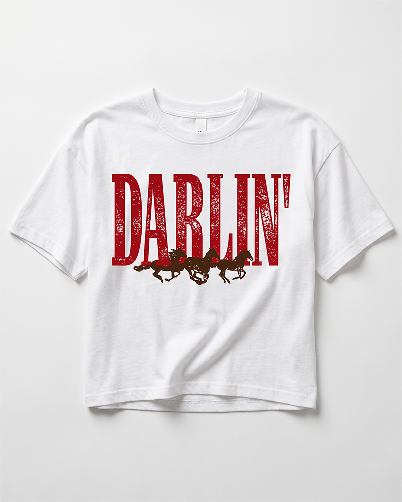 White Darlin' Western horse crop top with distressed red lettering and brown running horse graphic.