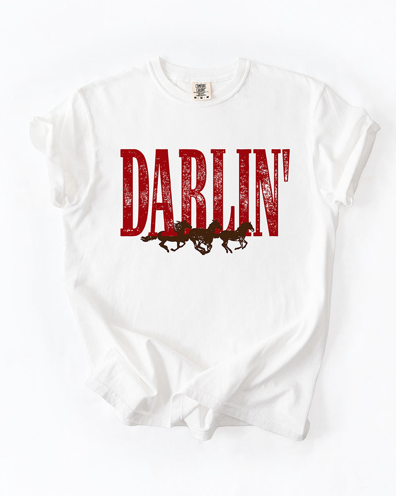 White Darlin' Western horse heavyweight tee with distressed red lettering and brown running horse graphic.