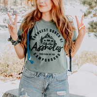 Model wearing Drunkest Bunch of Assholes tee in bay — funny campground graphic t-shirt