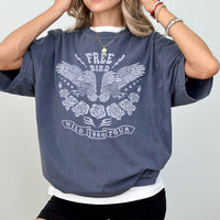 Model wearing Free Bird tee in denim — edgy, rock n’ roll-inspired t-shirt