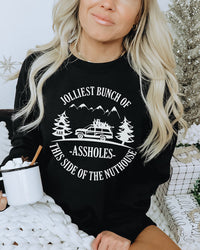 Woman wearing black Jolliest Bunch of Assholes Christmas Vacation sweatshirt