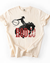 Ivory Rodeo Western heavyweight tee with distressed black cowboy and bucking horse graphic over red lettering.