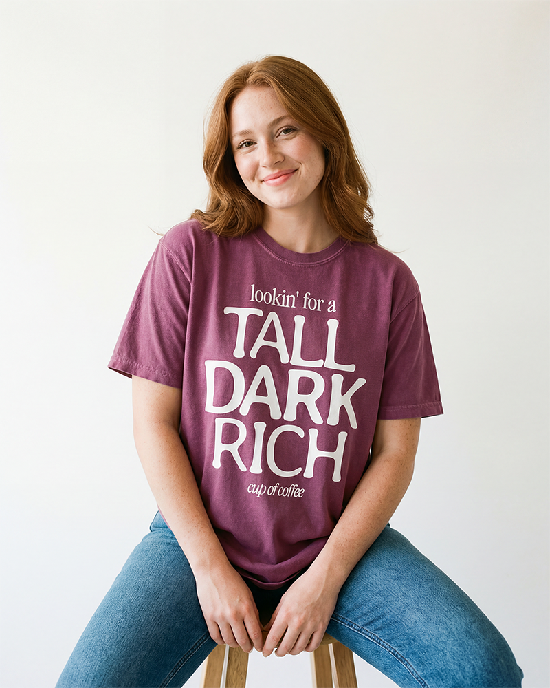 Tall Dark Rich Cup of Coffee heavyweight graphic tee in Berry on female model
