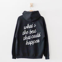 Black What’s the Best That Could Happen hoodie flat lay with statement back print