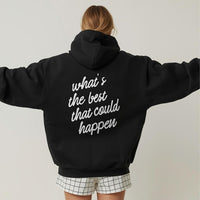 Female model wearing black What’s the Best That Could Happen hoodie with statement back print