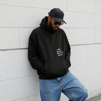 Male model wearing black What’s the Best That Could Happen inspirational hoodie front view