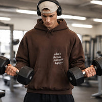 Male model wearing dark chocolate What’s the Best That Could Happen hoodie front view