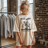 Model wearing Wild West Cowgirl Club tee in ivory — western graphic t-shirt for women
