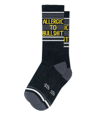 Black Allergic To Bullshit cotton-blend gym socks with yellow text, white stripes, and gray heels