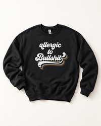Black Allergic to Bullshit crewneck sweatshirt with distressed white blue and rust retro graphic