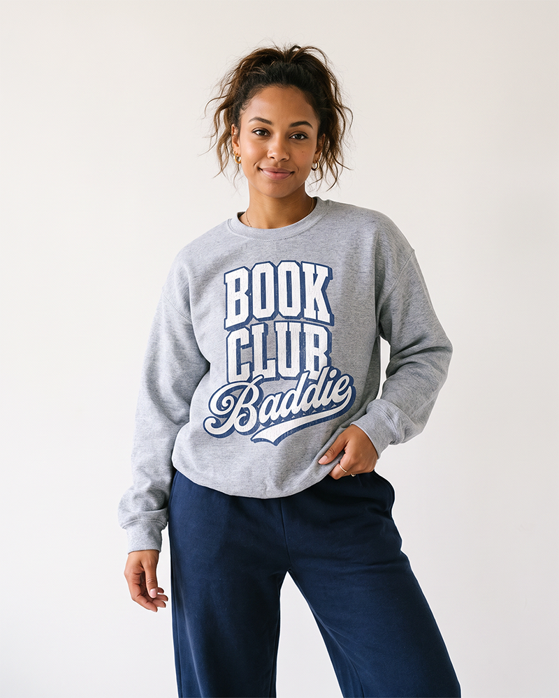 Woman wearing sport grey Book Club Baddie crewneck sweatshirt