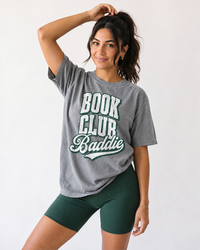Woman wearing grey Book Club Baddie book lover graphic t-shirt