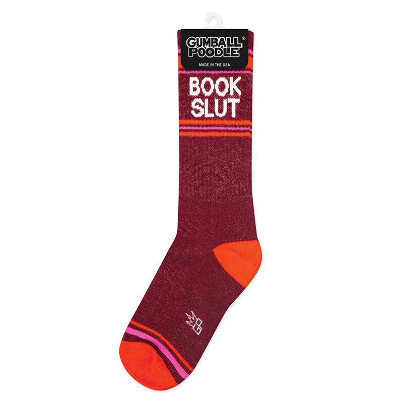Book Slut burgundy gym sock with white lettering and pink and orange accents in retail packaging