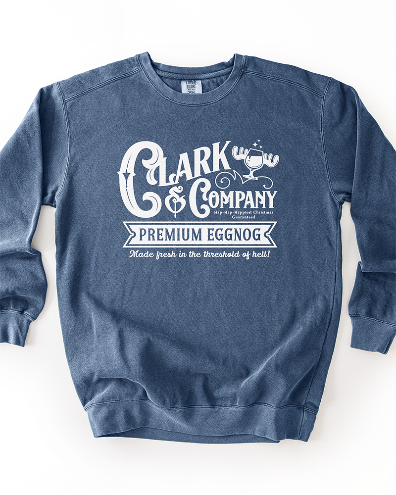 Denim blue heavyweight crewneck sweatshirt with white Clark & Company Premium Eggnog graphic inspired by Christmas Vacation.