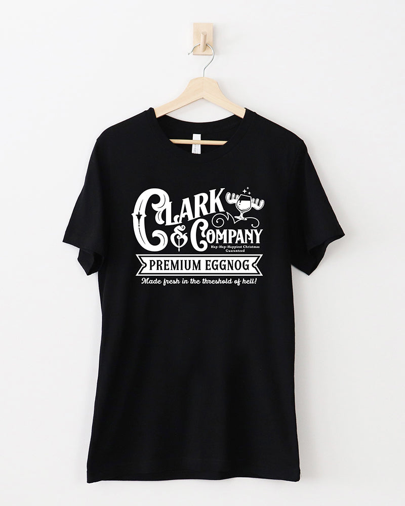 Black Clark & Company Premium Eggnog lightweight Christmas t-shirt with vintage white graphic and moose-shaped eggnog glass.