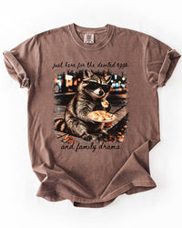 Espresso brown heavyweight graphic T-shirt featuring a raccoon holding deviled eggs with black cursive lettering.