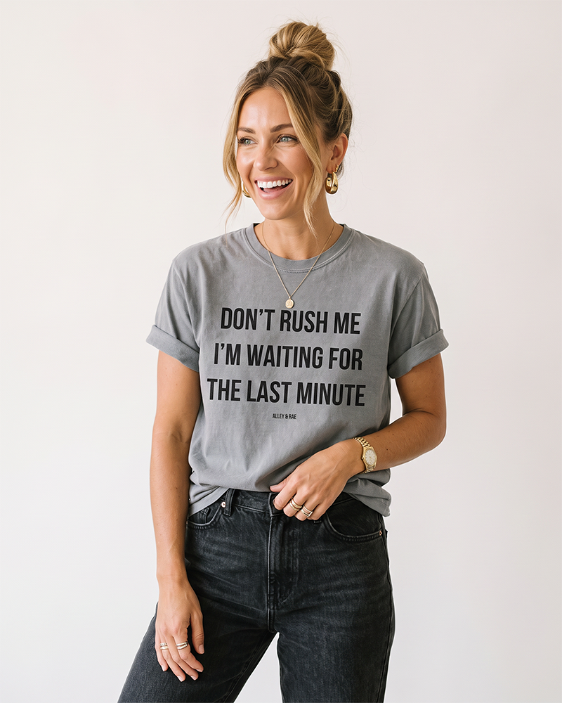 Woman wearing Grey funny procrastination graphic tee with Don't Rush Me quote