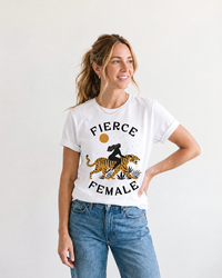 Woman wearing buttery soft Fierce Female graphic tee with blue jeans