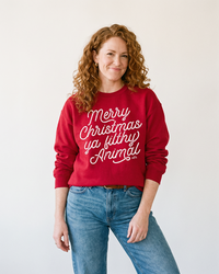 Women's cardinal Merry Christmas Ya Filthy Animal sweatshirt for Christmas movie fans