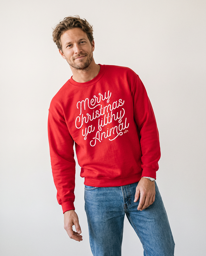 Men's red Merry Christmas Ya Filthy Animal sweatshirt inspired by the classic Home Alone Christmas movie