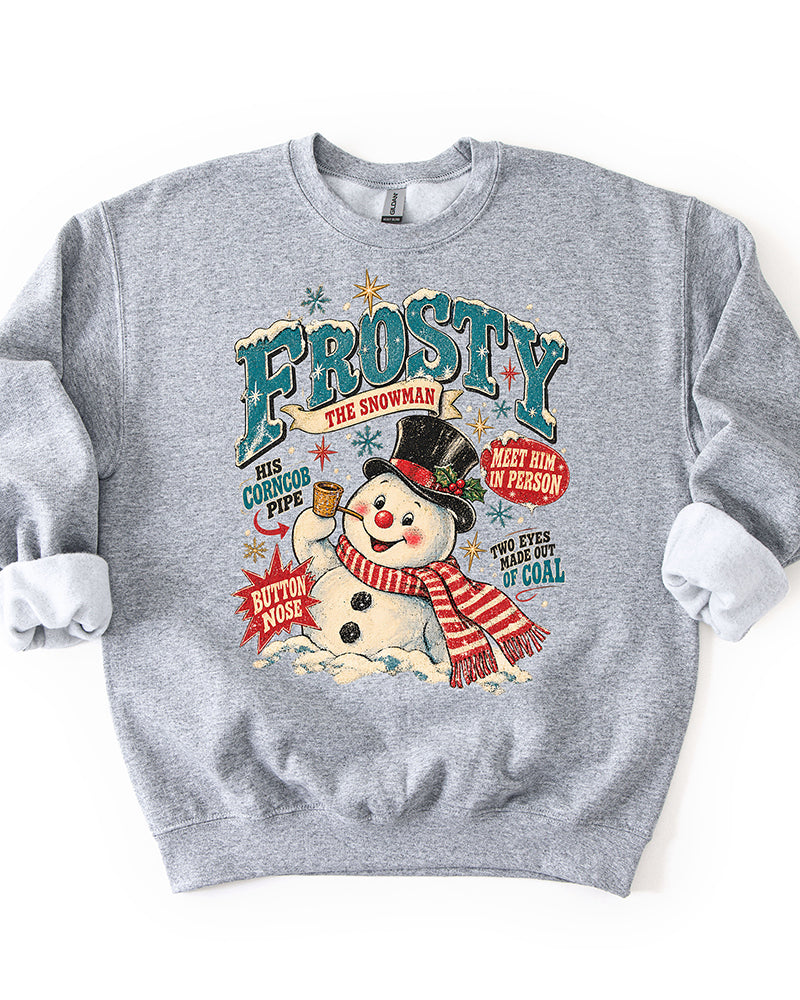 Sport Grey Frosty the Snowman Christmas sweatshirt featuring oversized vintage teal lettering, smiling snowman, red striped scarf, and retro holiday artwork.