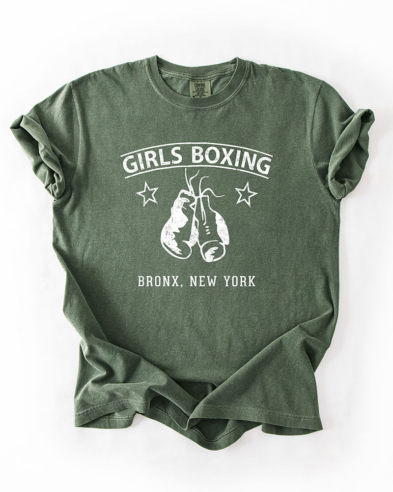 Hemp green Girls Boxing Bronx New York heavyweight graphic tee with distressed white boxing gloves and vintage lettering.