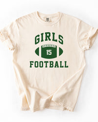 Ivory Comfort Colors heavyweight graphic tee with forest green Girls Football lettering and number 15 football design.