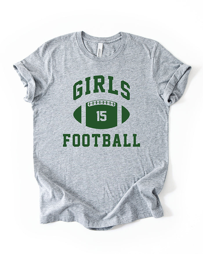 Athletic Heather Girls Football graphic t-shirt with green varsity lettering, football illustration, and number 15.