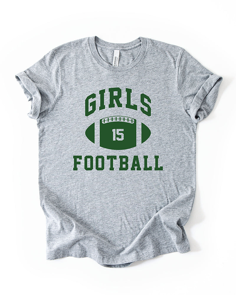 Athletic Heather Girls Football graphic t-shirt with green varsity lettering, football illustration, and number 15.