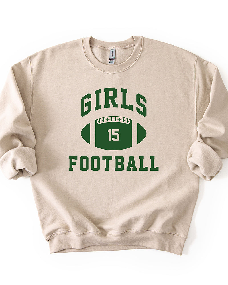 Sand beige Girls Football sweatshirt with forest green varsity lettering and vintage-inspired football graphic.