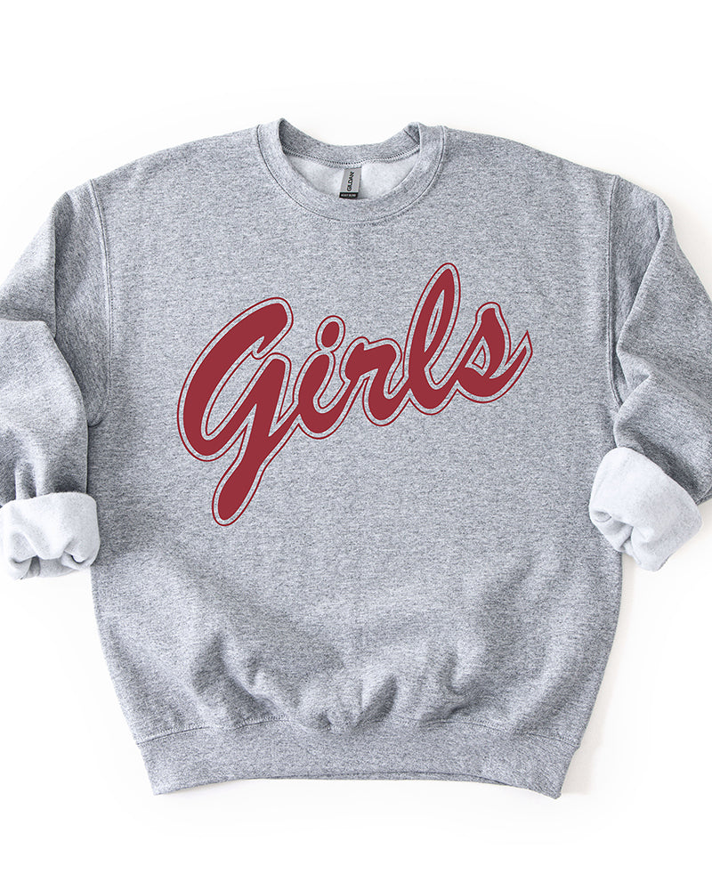 Sport grey Girls crewneck sweatshirt with oversized dusty rose-red script lettering inspired by Monica Geller's '90s style.