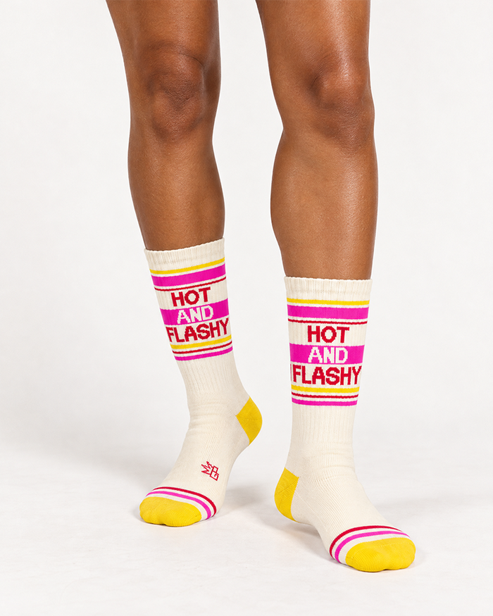 Woman wearing Hot And Flashy gym socks in cream with pink stripes and yellow toes