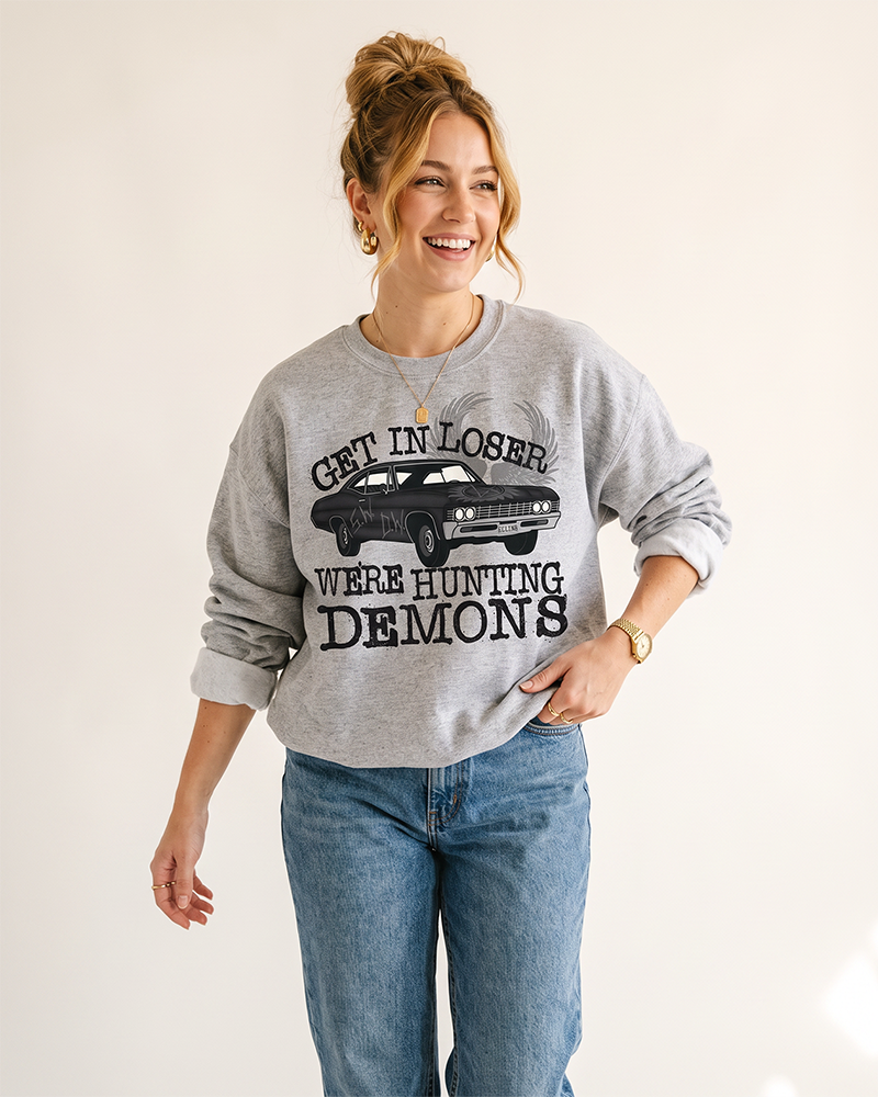 Hunting Demons Supernatural inspired crewneck sweatshirt in Ash Gray on female model