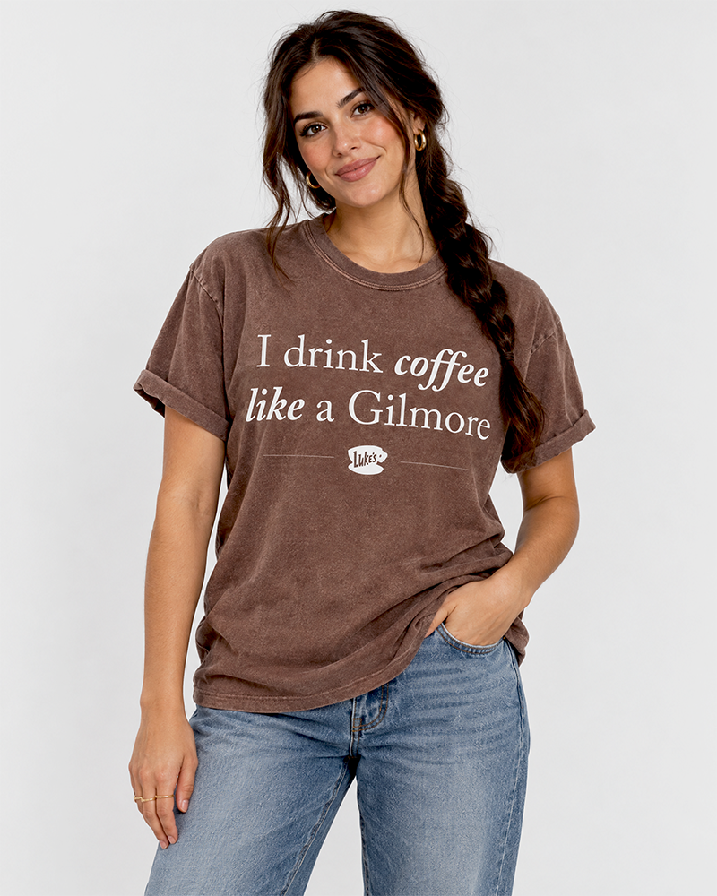Woman wearing espresso brown I Drink Coffee Like a Gilmore shirt