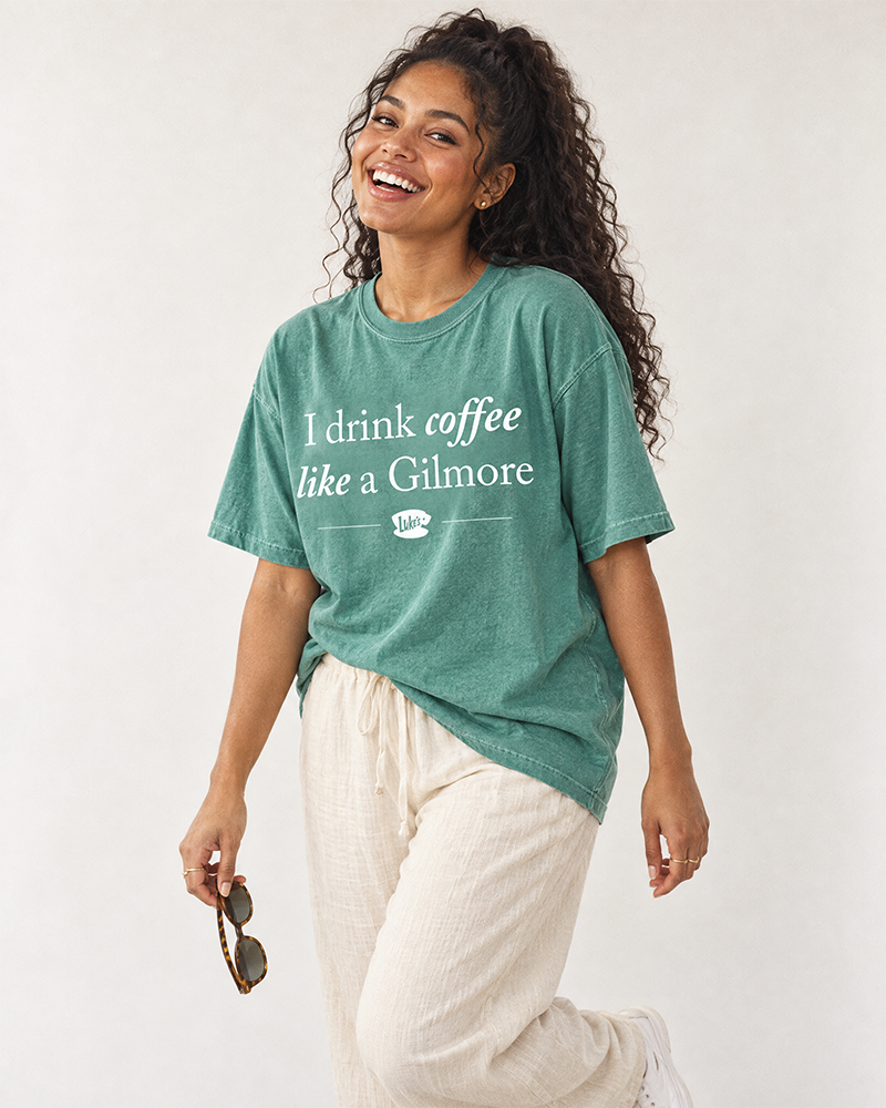 Woman wearing light green Gilmore Girls inspired coffee tee