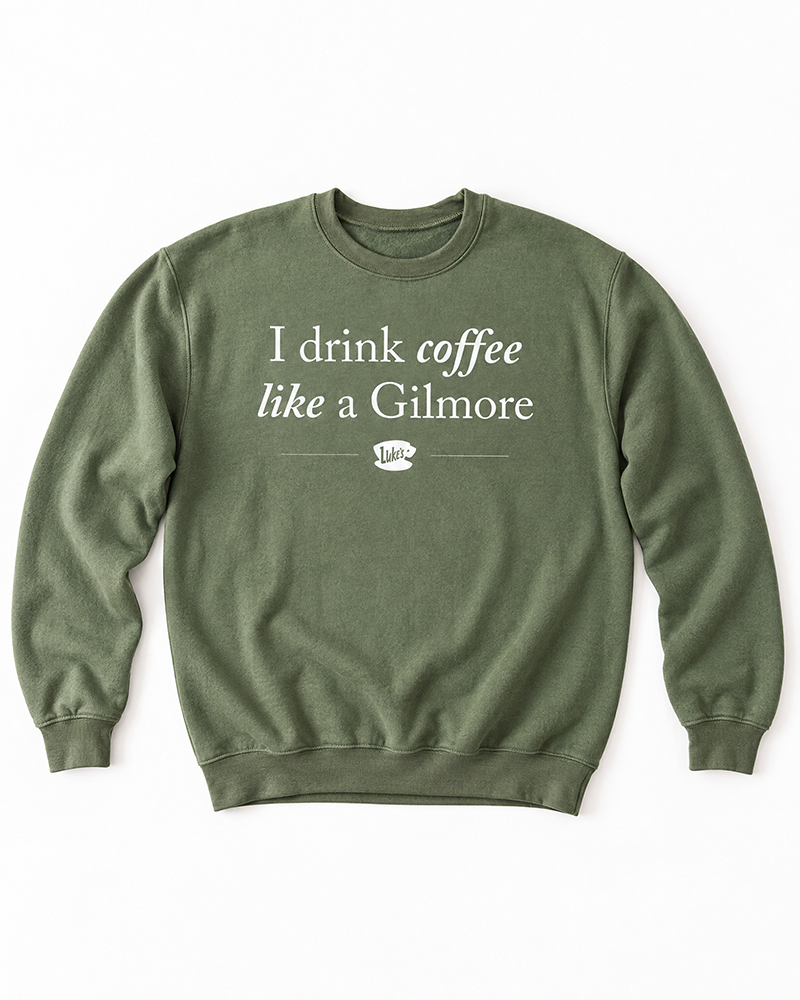 Military green I Drink Coffee Like a Gilmore sweatshirt with white lettering and Luke’s coffee cup graphic