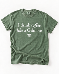 I Drink Coffee Like a Gilmore graphic tee in moss green