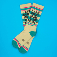 I Like Dogs More Than People funny dog socks with teal accents and pink striped details