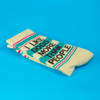 Folded I Like Dogs More Than People novelty socks with yellow, teal and pink retro design