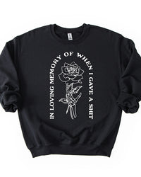 Black In Loving Memory crewneck sweatshirt with white skeleton hand holding a rose graphic