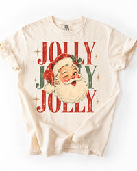 Ivory vintage Santa Christmas graphic T-shirt featuring a winking Santa Claus, festive holly, gold stars, and retro Jolly Jolly Jolly lettering.