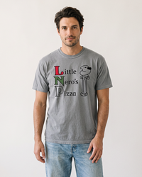 Man modeling a grey Little Nero's Pizza heavyweight unisex graphic tee with light blue jeans