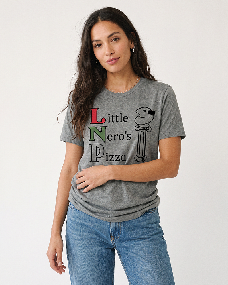 Woman modeling a heather gray Little Nero's Pizza lightweight unisex graphic tee with blue jeans.