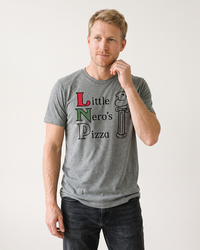 Man wearing a heather gray Little Nero's Pizza lightweight triblend tee with dark jeans.