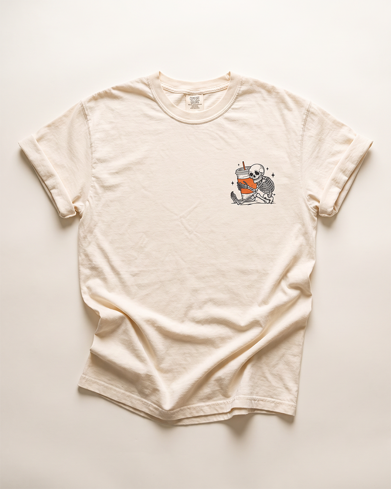 Ivory Comfort Colors coffee tee with small skeleton and iced coffee front graphic