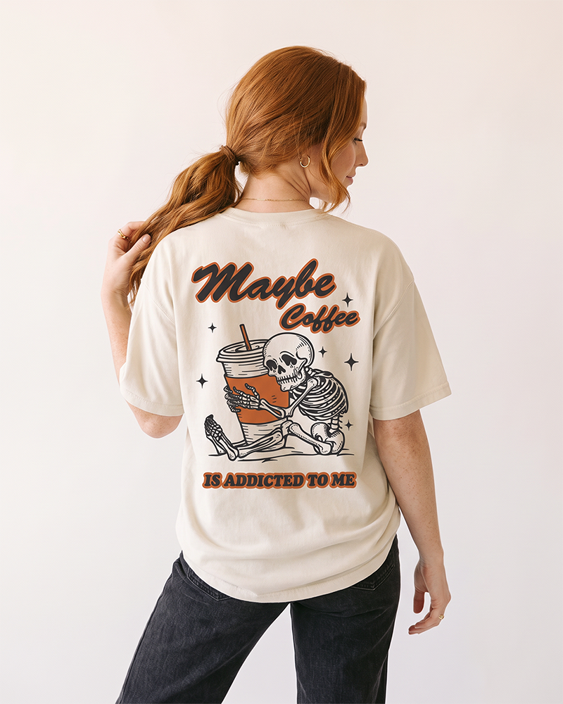 Back of ivory Maybe Coffee Is Addicted to Me tee with skeleton coffee graphic