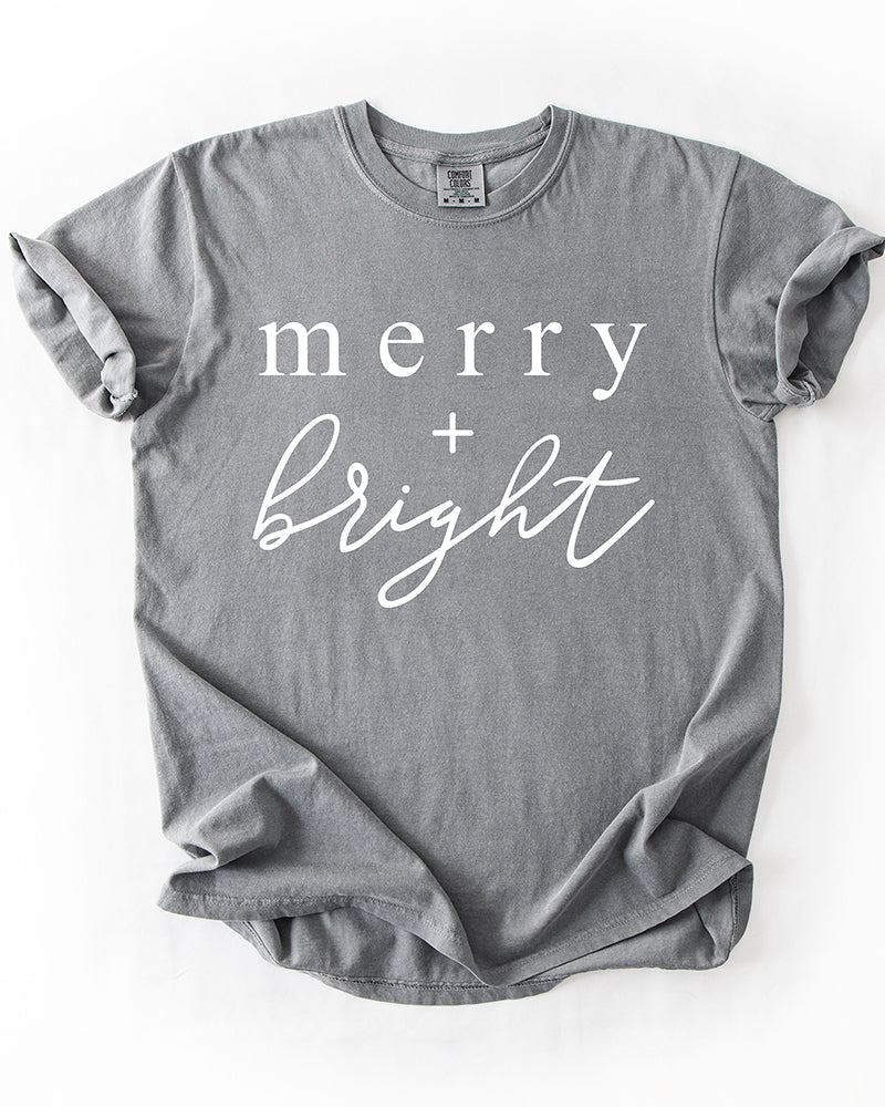 Grey Merry + Bright heavyweight holiday graphic tee with white lettering