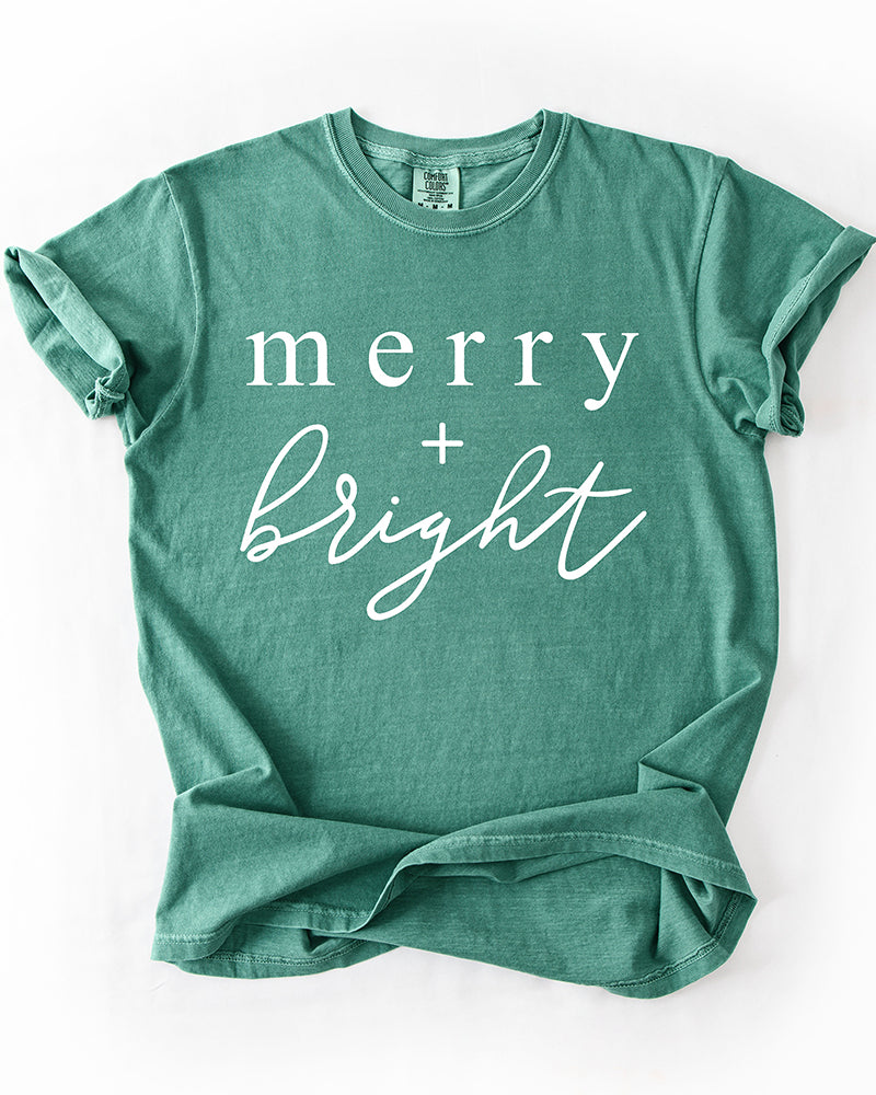 Light green Merry + Bright heavyweight Christmas graphic t-shirt